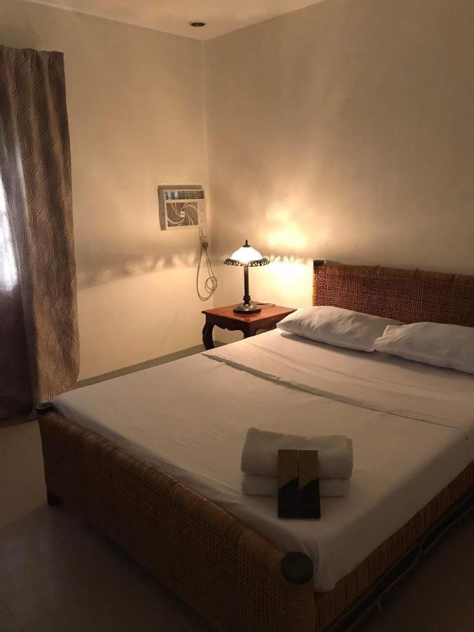 Hiraya Bed And Breakfast Роксас Номер фото